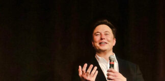 Elon Musk presents his startup's brain implant working in a pig