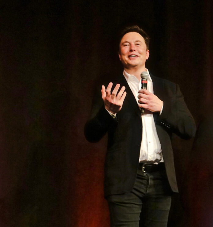 Elon Musk presents his startup's brain implant working in a pig